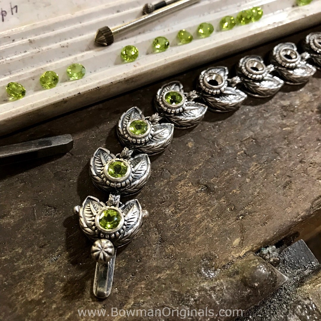 Handmade Sterling Silver Bracelet being set with Peridot at Bowman Originals